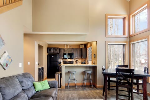 The kitchen cabinets and couches have been updated since this picture was taken