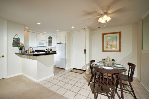 The dining table seats 4.