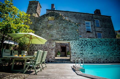 outdoor seating area and pool