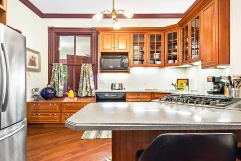 Sit up at the breakfast bar with a coffee while you keep the chef company