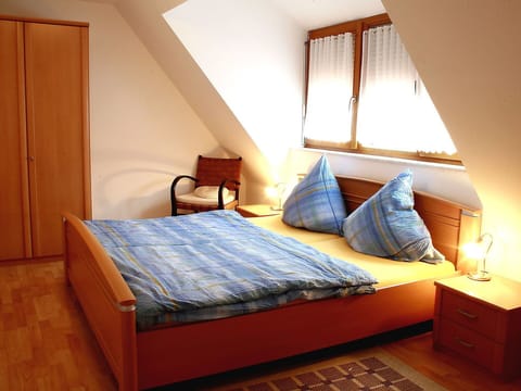 Furniture, Building, Comfort, Azure, Textile, Wood, Lighting, Interior Design, Bed Frame, Lamp