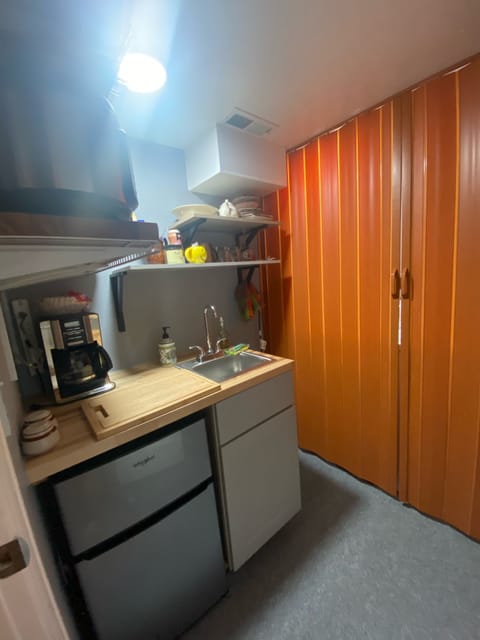 Kitchenette w/coffee pot, instapot, toaster, microwave, blender and utensils.