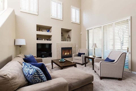 Bright open living room with vaulted ceilings