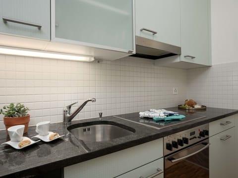 Kitchen, Countertop, Kitchen Appliance, Interior Design, Kitchen Sink, Cabinetry, Wood, Major Appliance, Flooring, Plumbing Fixture