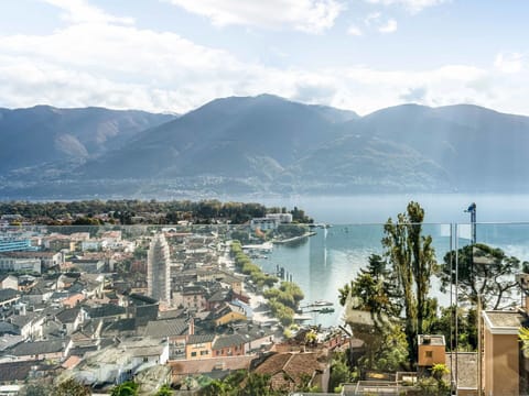 Mountainous Landforms, Mountain, Hill, Landscape, Residential Area, Coastal And Oceanic Landforms, Coast, Human Settlement, Mountain Range, Hill Station