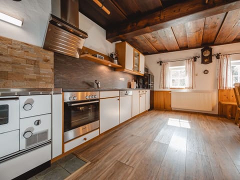 Wood, Flooring, Kitchen, Wood Flooring, Floor, Countertop, Interior Design, Ceiling, Home, Hardwood