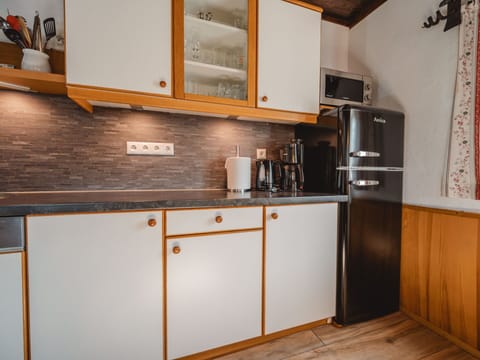 Kitchen, Countertop, Wood, Kitchen Appliance, Cabinetry, Major Appliance, Interior Design, Home Appliance, Plumbing Fixture, Furniture