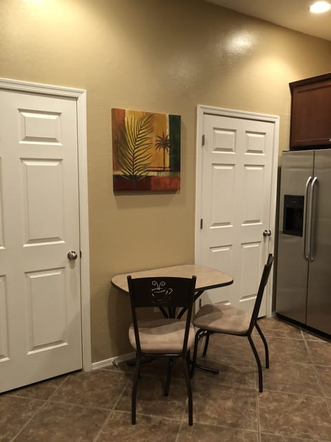 Kitchen table with two chairs.