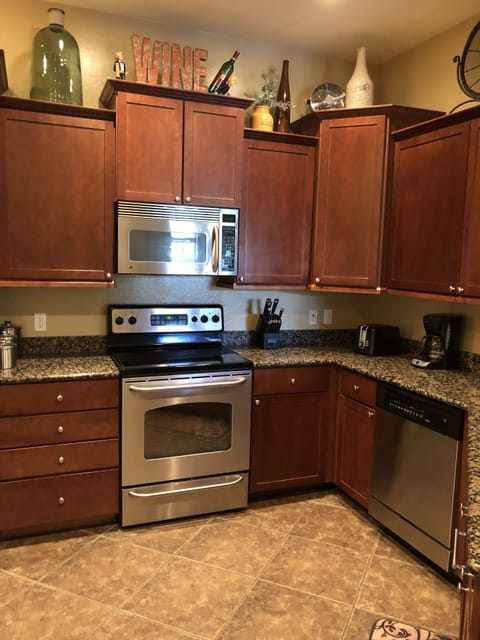 Kitchen, with Stainless Steel appliances.