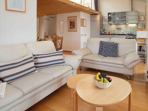 Furniture, Interior Design, Couch, Flooring, Floor, Wood, Room, Living Room, Table, Chair