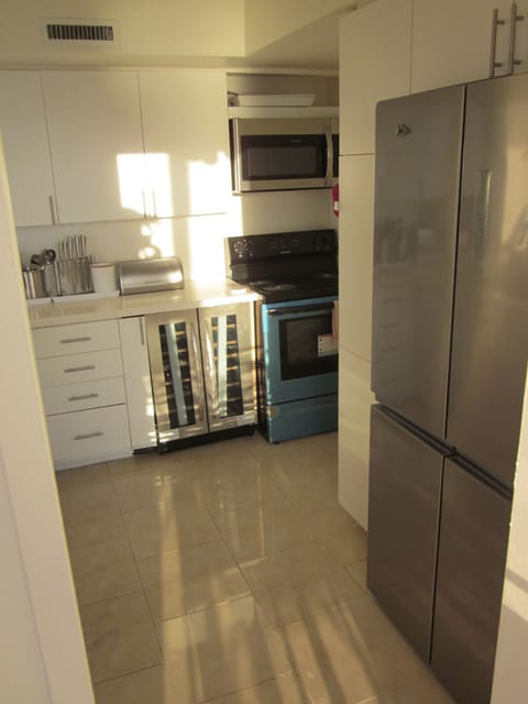 Clean kitchen with wine cooler