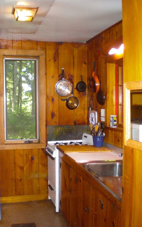 Kitchen - oven, microwave, coffee-maker, refridgerator and sink