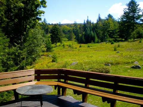 View of a private meadow from Hill Cottage porch