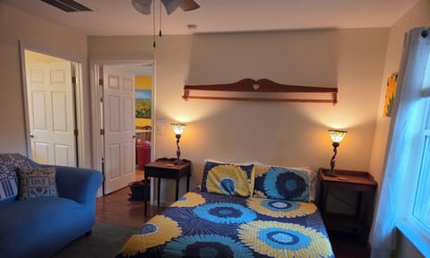 bedroom with loveseat