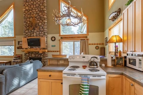 When mealtime comes around, you’ll enjoy the convenience of this charming, well-stocked kitchen.