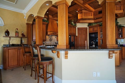 Enjoy your morning coffee or hang with those making the meals at the attached breakfast bar in the kitchen area