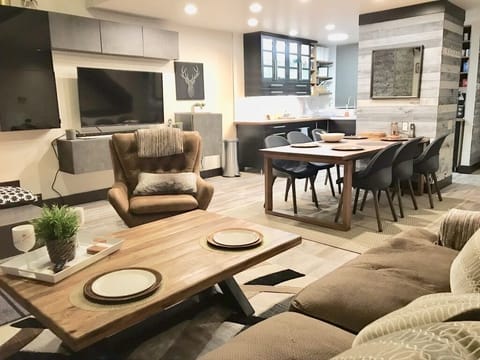 Open floor plan kitchen, dining room, living room area.