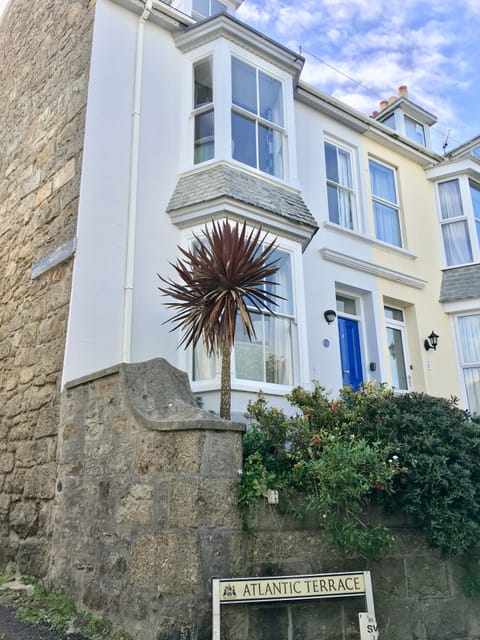 The outside of the house on the corner of Bowling Green.