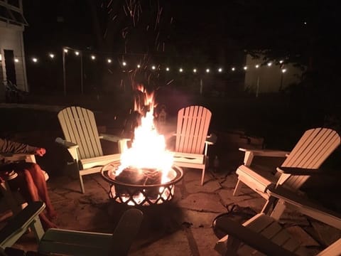 Flagstone Fire area with Adirondack chairs. Perfect for those Summer nights-
