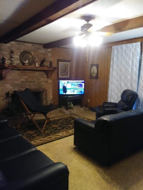 Living Room with soft, loveseat, recliner and chair