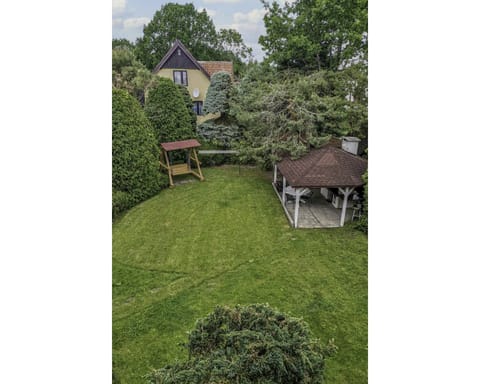 Plant, Cloud, Property, Building, Tree, Natural Landscape, Sky, House, Land Lot, Vegetation