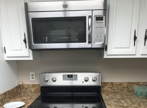 Maytag microwave/convertible oven, and Maytag full size oven and stove top.