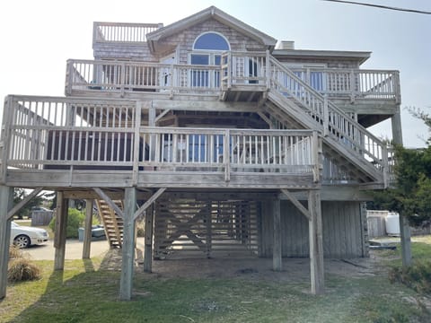 Side of home with ocean side view 