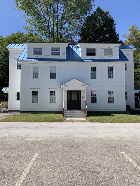 House front. Custom resided and painted, fittingly named BM Snowfall White