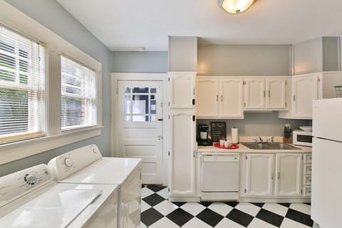 Kitchen and laundry, the door is where you enter from the driveway