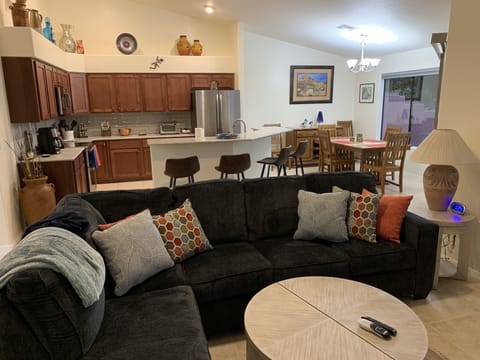 Multiple areas of comfortable seating and open to the kitchen and dining area