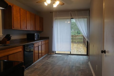 Large kitchen with walk out deck
