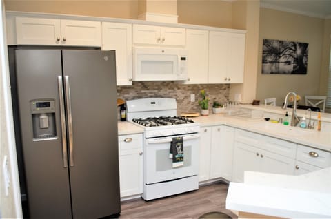 Filtered water is supplied thru fridge & skinny faucet. Water pitcher in fridge.