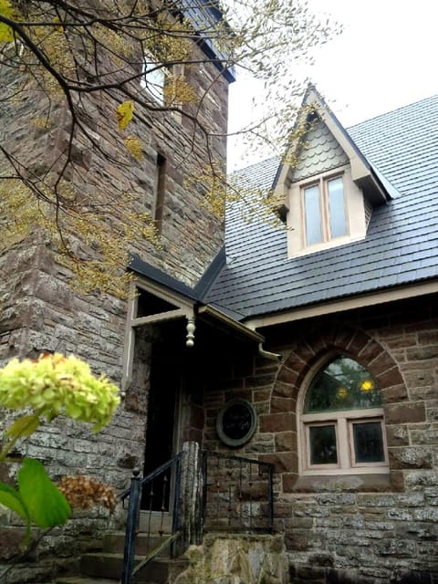 Entire Main Floor of a Historic Gothic Stone Church: Front Entry