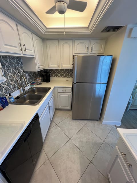 Kitchen with Refrigerator, ice maker, coffee maker, garbage disposal, toaster, 