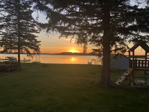 Large backyard to enjoy, complete with fire pit. 