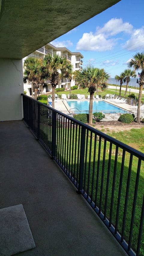 View of pool from large balcony
