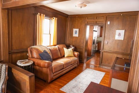 Parlor room: 43" TV, 1961 Magnavox console, books, vintage magazines, games,