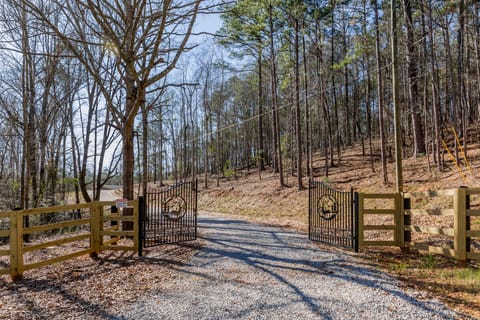 Entrance down gravel driveway; secluded from main road.