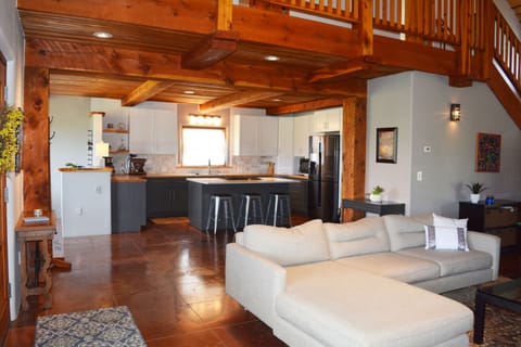 Showing 3 bar stools in this well furnished gourmet kitchen