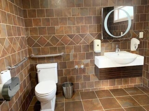 Half bathroom next to the bar area