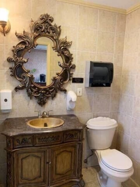 Half bathroom next to the our commercial kitchen