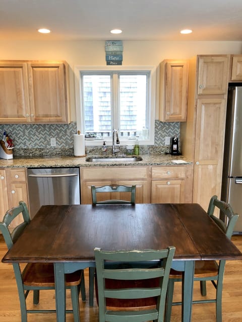 Kitchen and large dining room table 