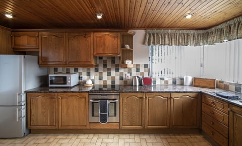 Fridge/freezer, dishwasher and all the kitchen tools needed to cook and bake. 
