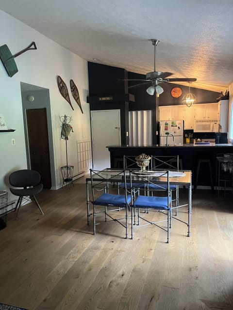 Large common space with dining for four, and a breakfast bar with extra seating!