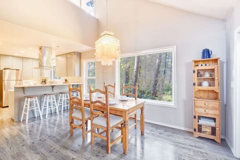 Dining table seats 4 with more seating at the kitchen bar
