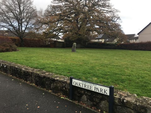 Across the street, a good landmark when you are driving to the house