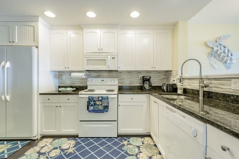 The Kitchen comes with fridge, range, microwave, dishwasher, Mr coffee