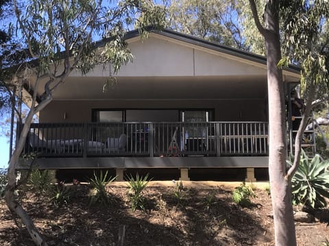 Lovely undercover verandah at the front of the property with rural views 
