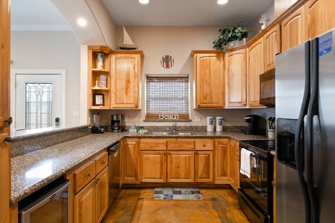 Fully stocked Kitchen with pots, pans and dishware to enjoy home cooked meals with the family!