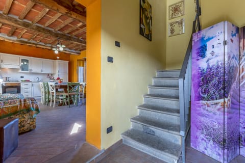 Entrance on ground floor and staircase leading to bedrooms on first floor